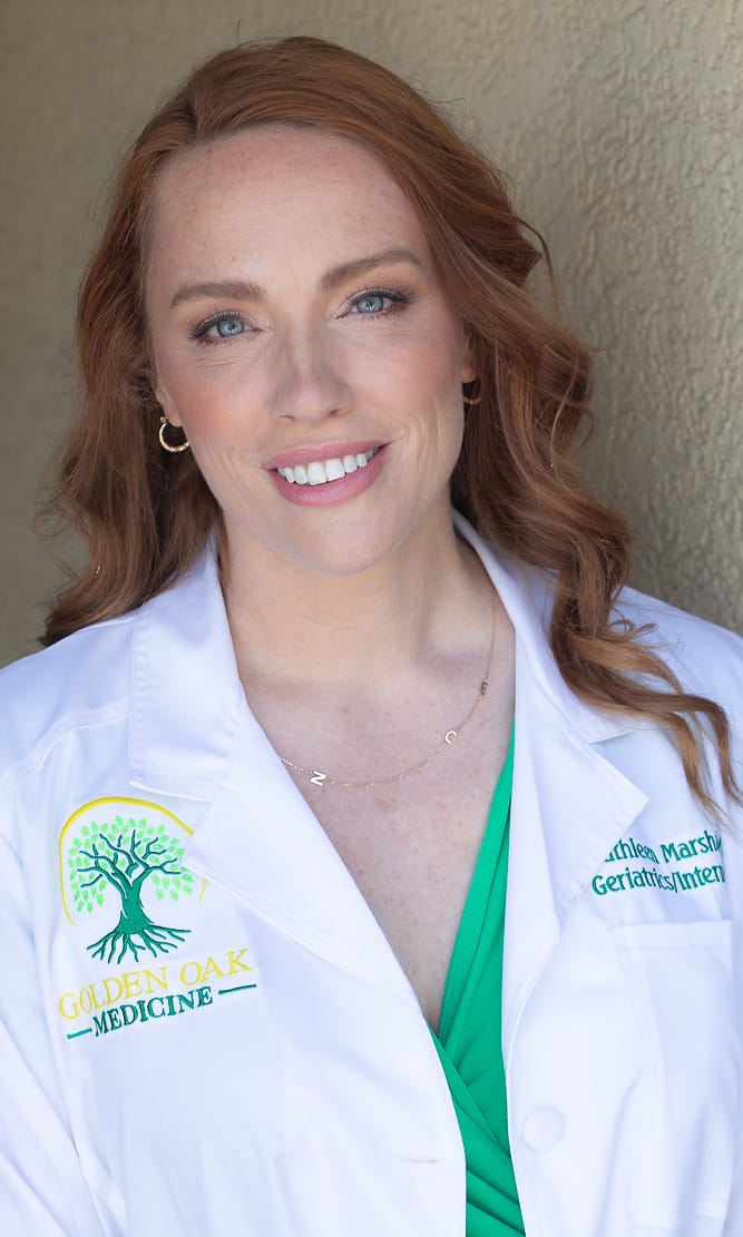 On-location medical portrait in a Golden Oak Medicine coat, photographed on the client's premises