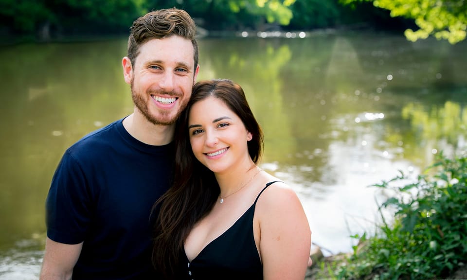 Outdoor couple portrait beside a lake in Asheville