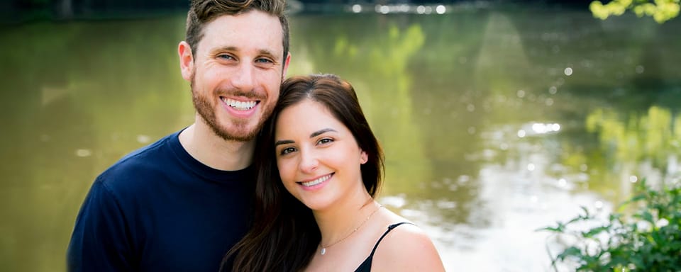 Outdoor couple portrait beside a lake in Asheville
